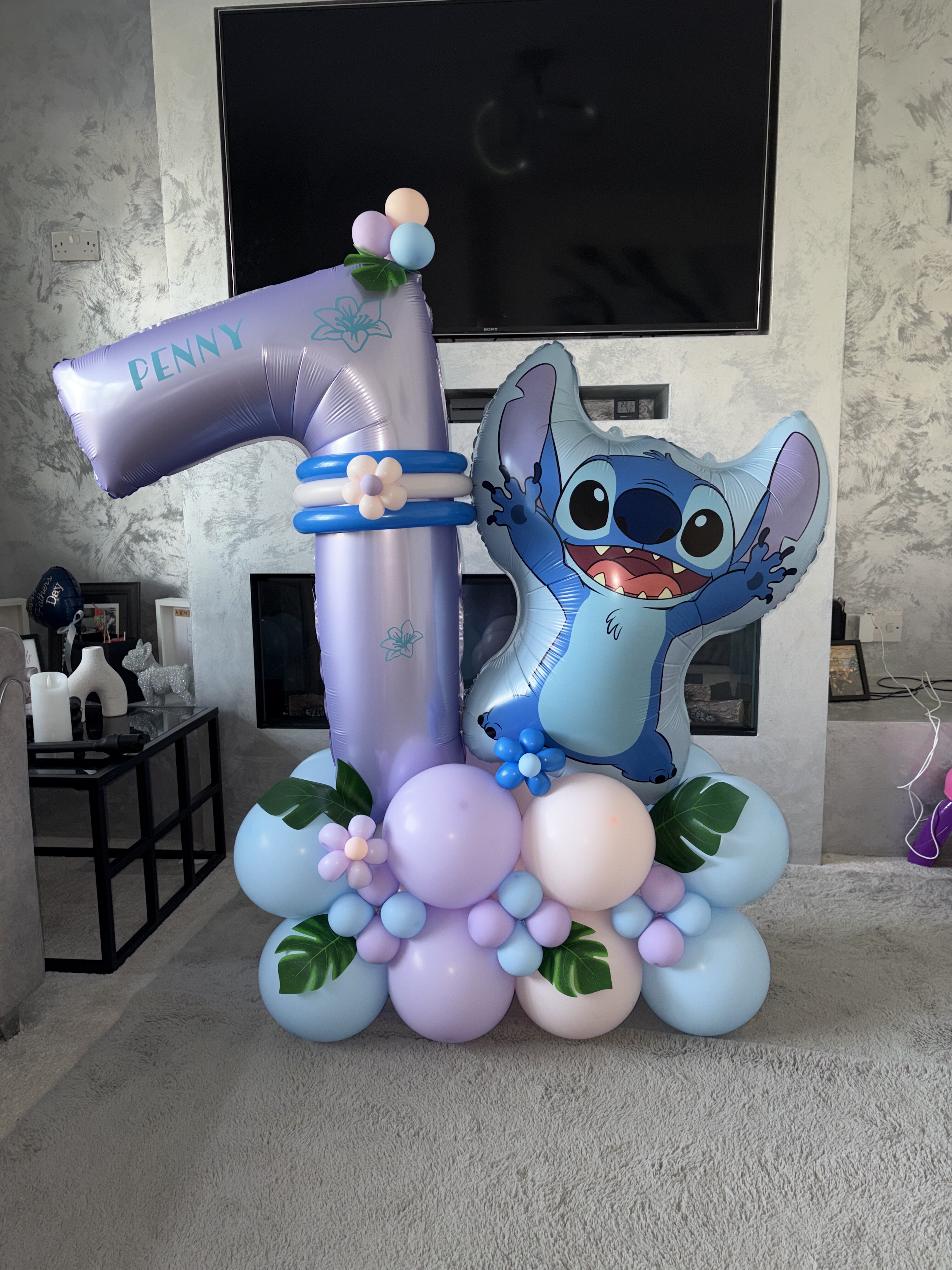 Personalised Stitch-themed first birthday balloon stack